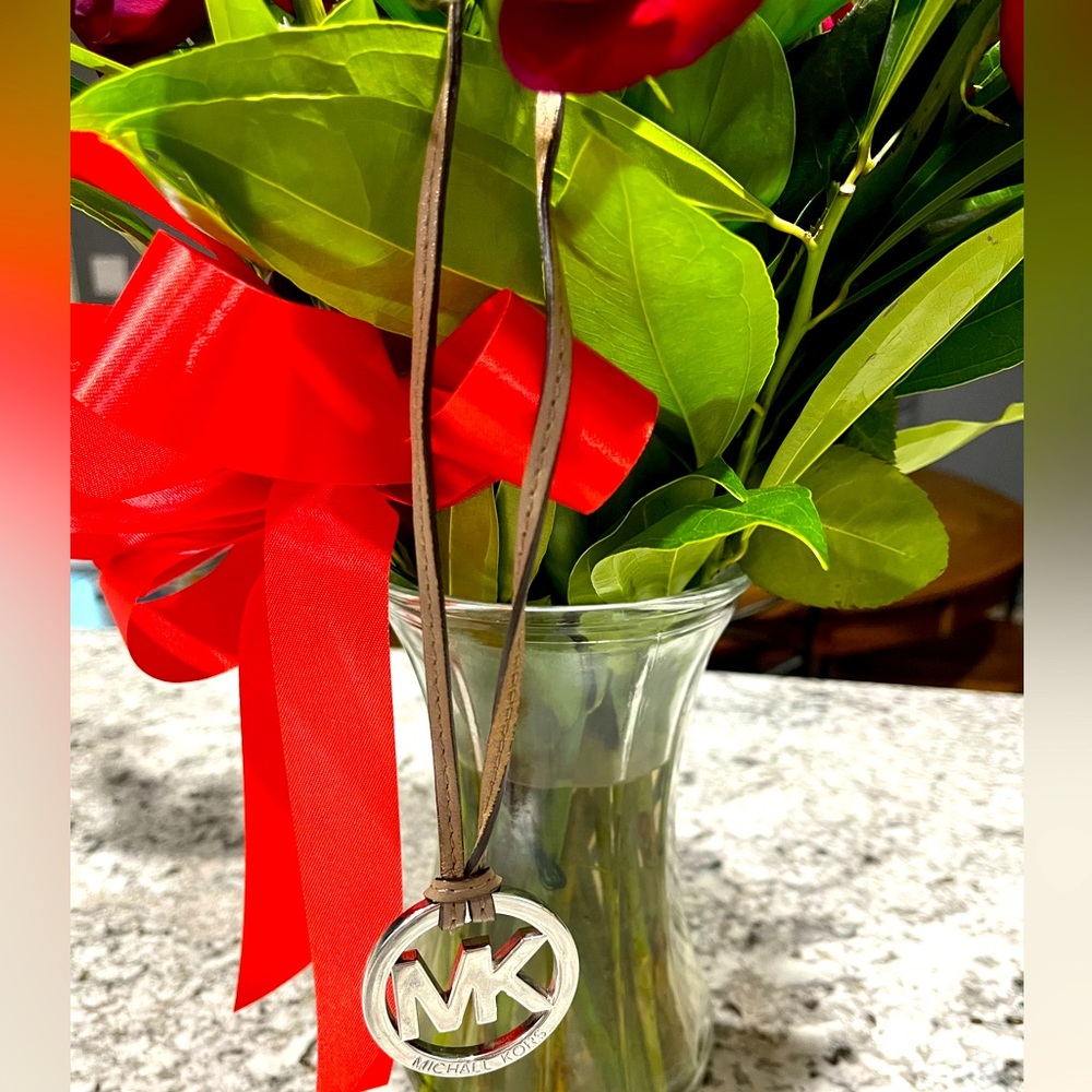Michael Kors metal bag charm